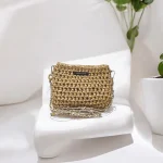 Sera Pochette crochetée en fil imitation cuir or avec bandoulière métal