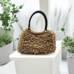 Bella Sac à boucles crocheté en ficelle de jute beige avec anses amovibles en cuir noir